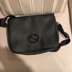 Black Gucci messenger bag